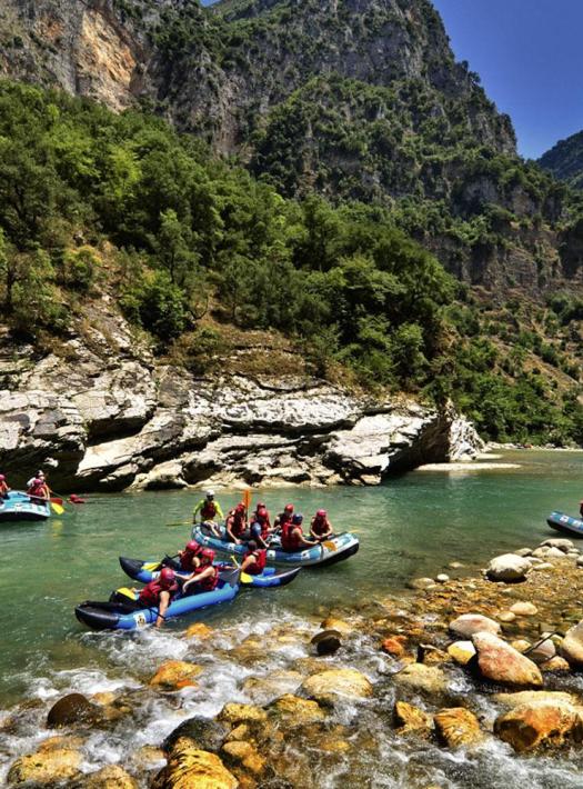 rafting in voidomatis river group photo